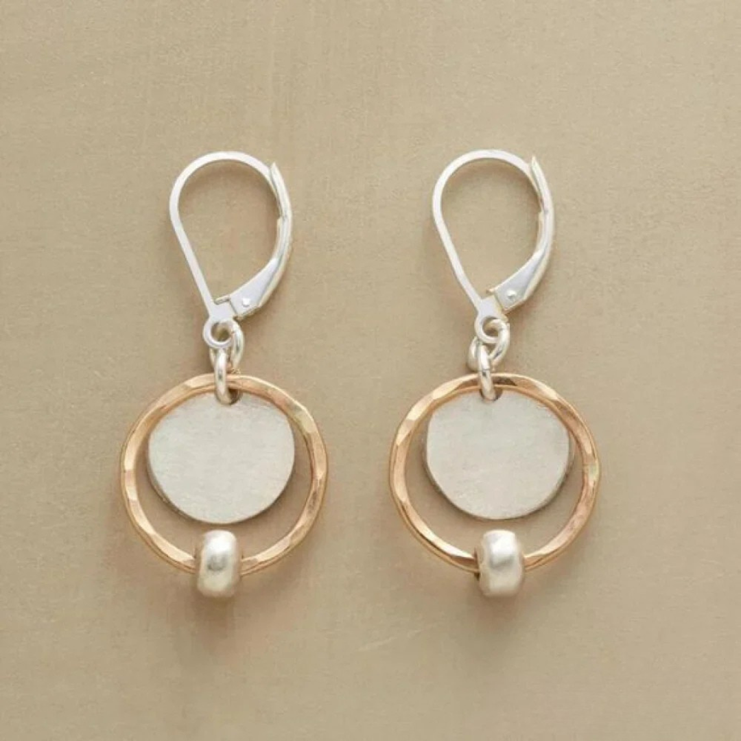 Stylish gold and silver earrings with pearls