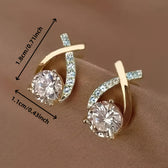 Earrings with golden cross and zirconia