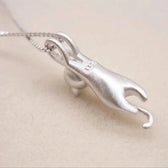 Playful necklace with kittens made of 925 silver
