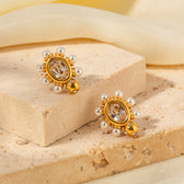 Elegant gold earrings with pearl