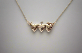Sacred Hearts of the Holy Family Necklace